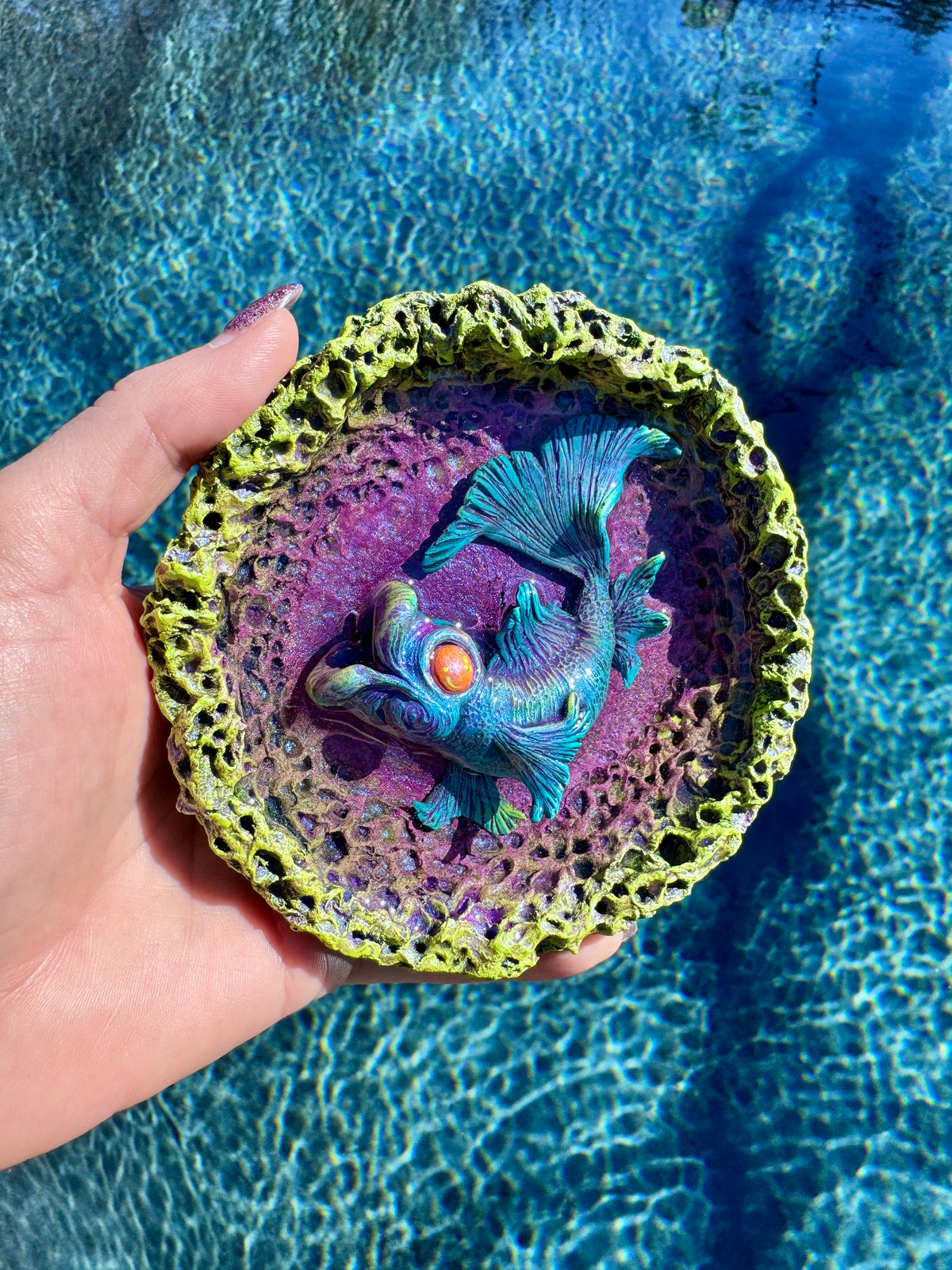 5) “Fish Kiss”