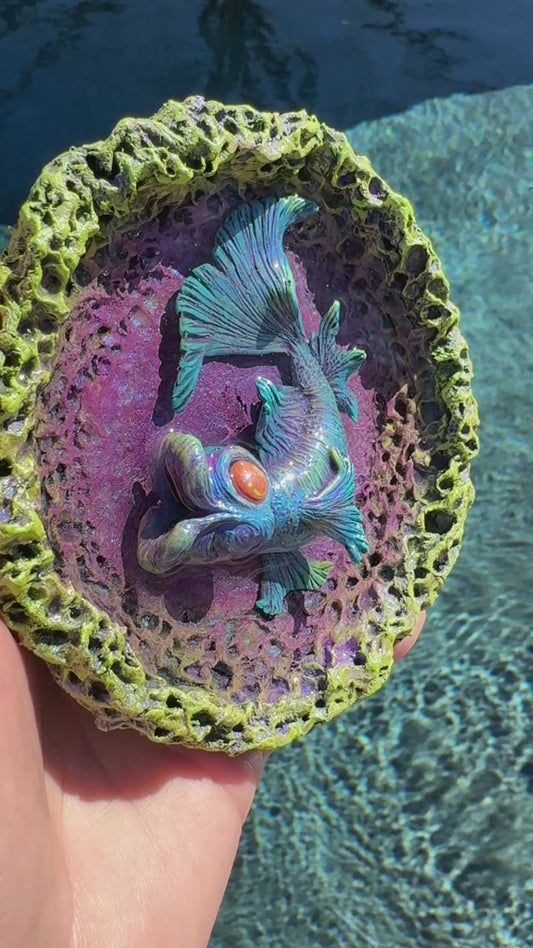 5) “Fish Kiss”